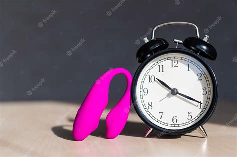 Premium Photo Time For Carnal Pleasures Alarm Clock And Stimulator G