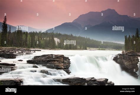 Athabasca Falls At Sunset With Mt Kerkeslin In The Back Ground Jasper