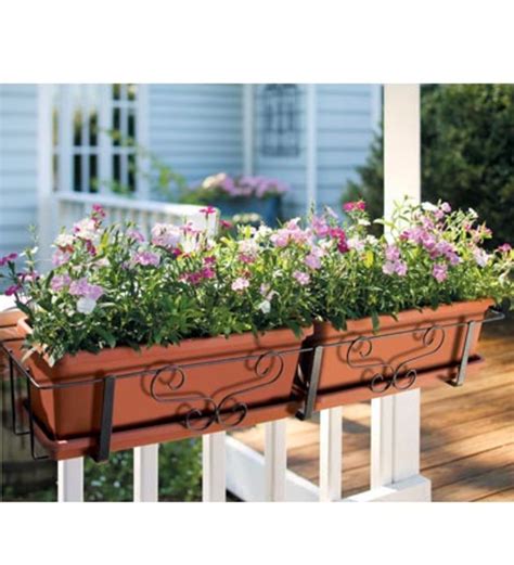 Made of zinc, a balcony railing planter fits balcony railings up to a diameter of seven centimeters; Window Boxes - Adding Beauty to Homes | hubpages