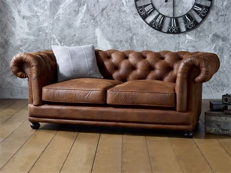 Chesterfield Style Faux Leather Sofa With Majestic Rolling Armrests And