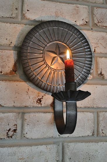 Missionthis is a 56 casablanca mission ceiling fan shown in the bronze patina finish with a set of teak wood blades. Round star sconce | Sconces, Primitive home, Ceiling fan