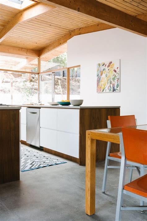 Mostly people use tufted chairs with natural wood legs, but here we choose this kitchen is designed to integrate the original architectural home details with modern mid century kitchen. Renovation Of Mid-Century Modern Home | Mid century modern ...