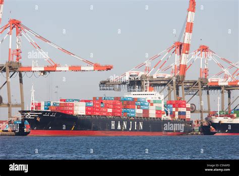 Container Ships Are Loaded At The Maher Terminals Container Terminal In
