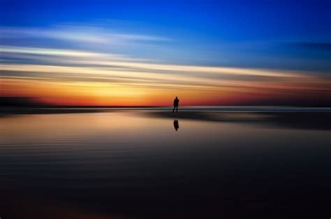 Download 1920x1080 Man Silhouette Standing Sunset Reflection