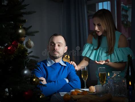Upset Man With Screaming Wife During Celebration Of Christmas Stock