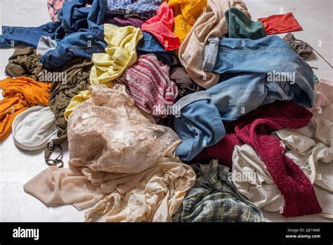 Pile Of Used Clothes On A Light Background Second Hand For Recycling