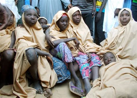 Militants Free Scores Of Abducted Nigerian Schoolgirls After Month In Captivity