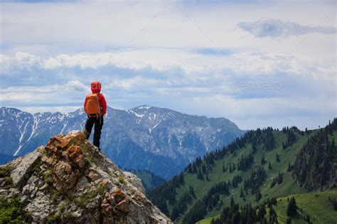 Hiker Stand On The Top Of Mountain Stock Photo By Lzf Photodune