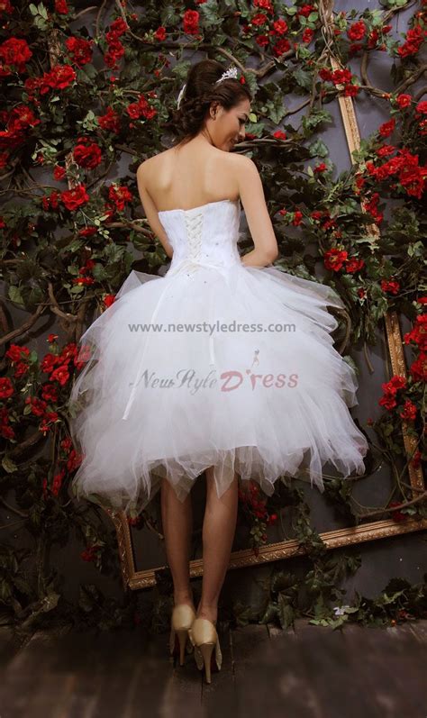 This awesome corset is this dress requires more than 210 hours to be completed. Ball Gown White Feathers Tiered Short Cocktail Dresses nm-0142