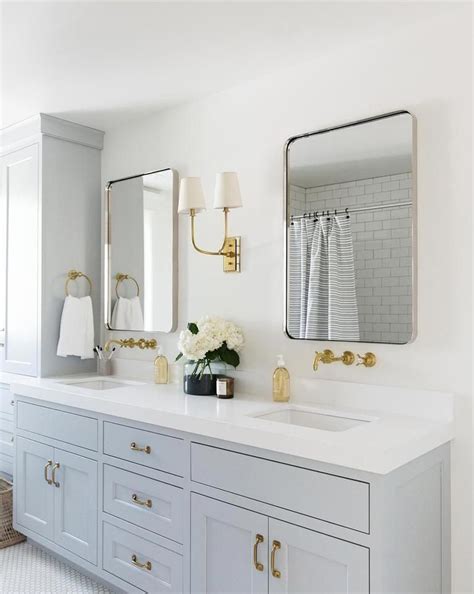 You might have a narrow bathroom without extra space on the side, or your mirror might be so large that the sconce placement won't work. Hulton Double Sconce - Polished Nickel / 4 | Bathroom ...