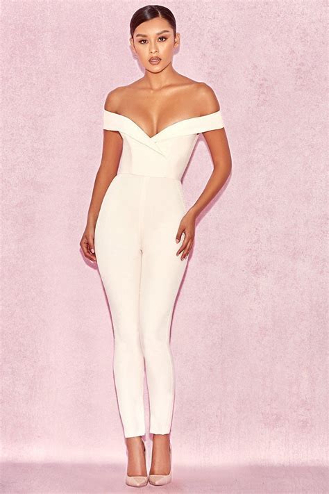 your curves deserve this ultra elegant white jumpsuit featuring an off the shoulder bust a v