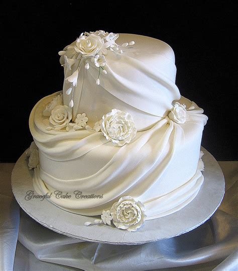 Elegant White Fondant Wedding Cake With Sugar Flowers And Flickr