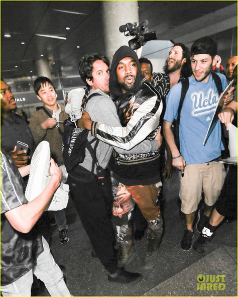 Photo Kanye West Breaks Up Paparazzi Fight At Lax 06 Photo 3584076 Just Jared