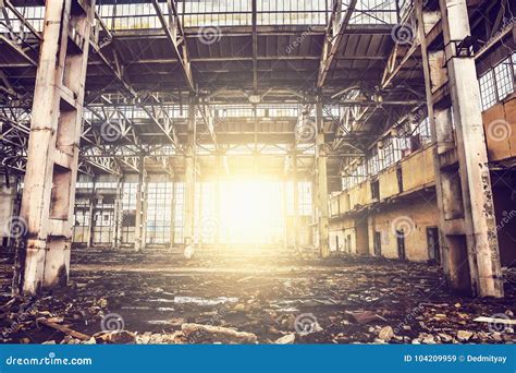Inside Abandoned Large Industrial Warehouse Hall With Garbage And