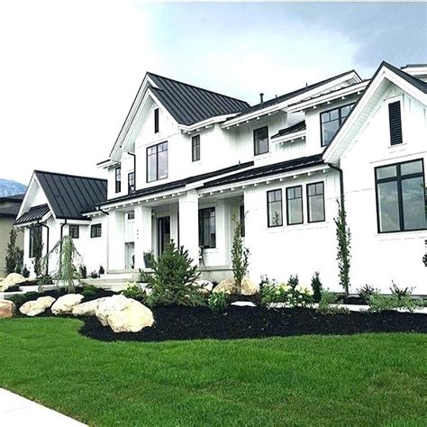 Blue, green, and white trims end up giving a calming appearance on the entryways of orange brick homes. white brick house with black trim black white brick house ...