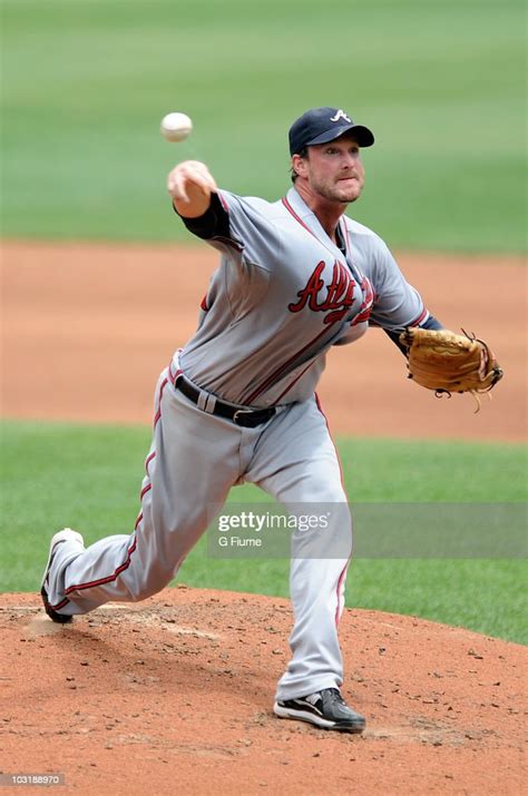 Derek Lowe Of The Atlanta Braves Pitches Against The Washington News