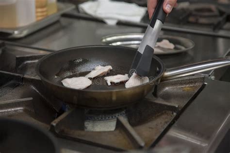 Hands Cook Fry In A Frying Pan Chicken Stock Image Image Of Closeup