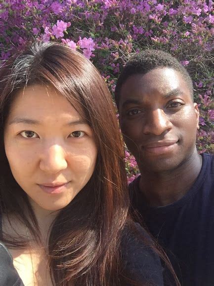 Afro French And Korean Couple Celebrating Interracial Love