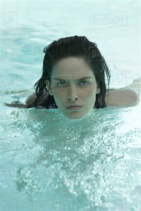 Woman Swimming In Pool Portrait Stock Photo Dissolve