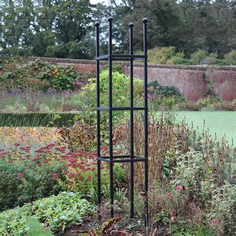 Rankgitter ammons aus metall dieses rankgitter ist die ideale wachstumsunterstützung für deine rosen und andere kletterpflanzen. Ranksäule | Rankhilfen aus Metall | Rankhilfen ...