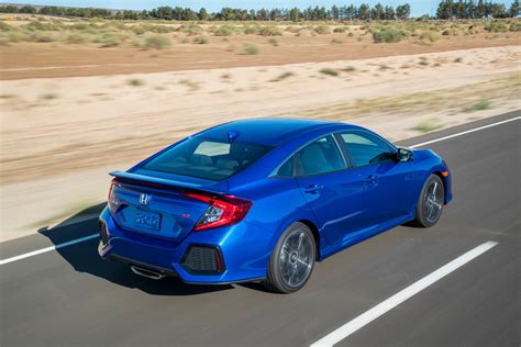 An aggressive sport bumper, the legendary red si badge, a menacing gloss black grille and that snarling lip make the civic si. 2019 Honda Civic Si: A Volume Knob Brings This Civic ...