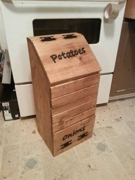A perfect storage bin for all of your taters & onions or anything else you need to store. Wooden potato & onion bin / vegetable storage / potato bin ...