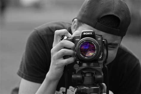 Man Holding Dslr Camera · Free Stock Photo