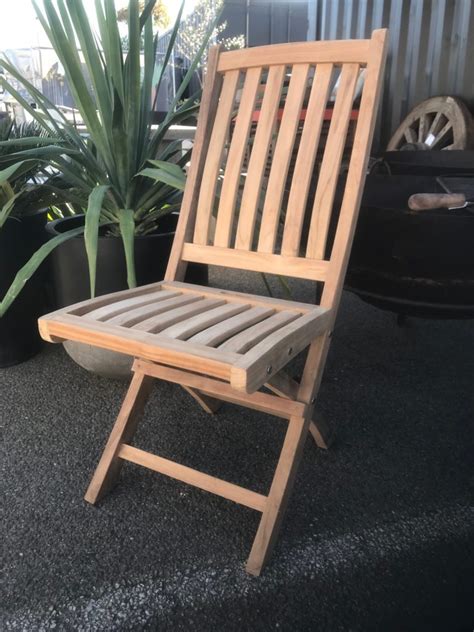 The chair has the capacity to hold a weight of 300 lbs. Teak Folding Chair - Sticks and Stones Outdoor