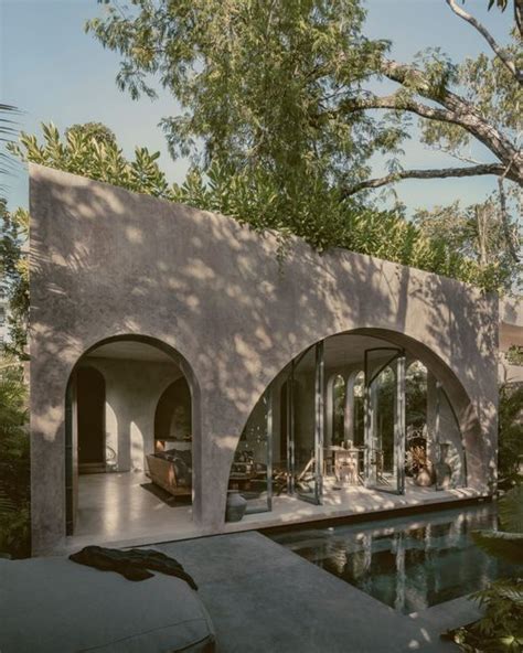 Dezeen On Instagram Arched Openings Create A Sense Of Fluidity Inside