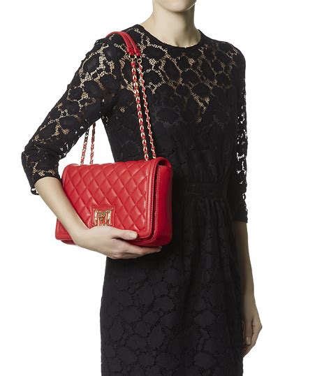 Discover our love moschino bags' collection on b3ndy and buy them at the best price. Love Moschino Medium Super Quilted Flap Bag in Red - Lyst