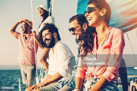 Happy Friends On A Yacht Stock Photo Download Image Now Friendship