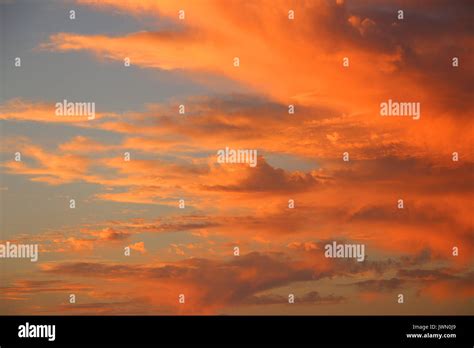 Brilliant Orange Clouds At Sunset Stock Photo Alamy