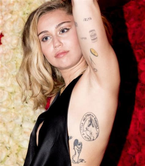 Miley Cyrus Upper Arm Tattoo