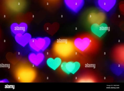 Valentines Colorful Heart Shaped Bokeh On Black Background Lighting