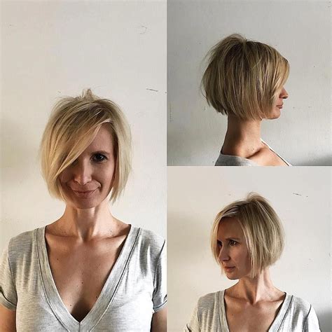 This Blonde Shaped Bob With Messy Texture And Long Side Swept Bangs Is
