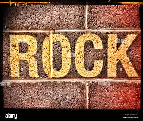 Work Rock On Wall Stock Photo Alamy
