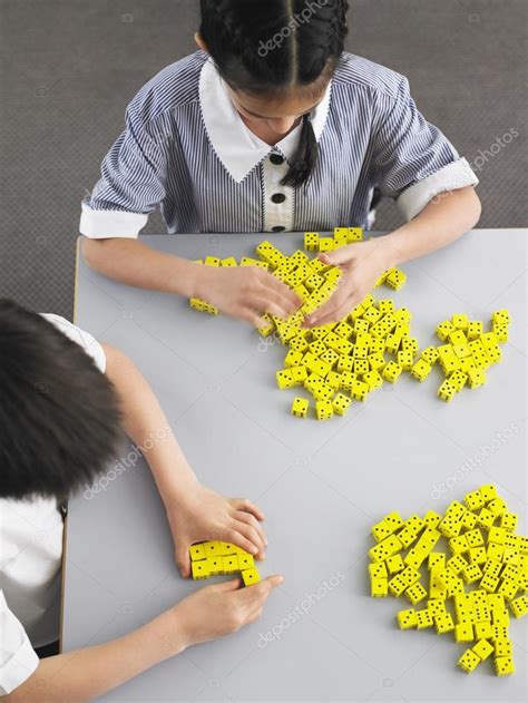 Elementary Students Playing With Dice — Stock Photo © Londondeposit