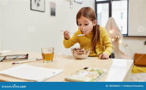 Get Cereals And Become Stronger Caucasian Cute Little Girl Eating