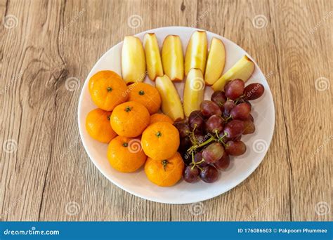 Apples Oranges Grapes On A White Plate Stock Image Image Of Diet