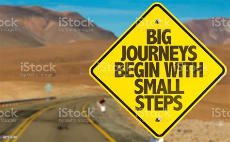 Big Journeys Begin With Small Steps Sign With Sky Background Stock