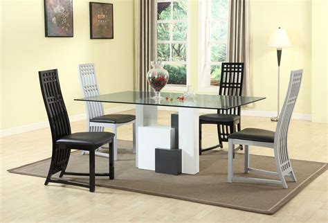 Sit outside on your own and eat breakfast in the morning sun on a small table or host large family barbecues with a table for over six people. Graceful Rectangular Clear Glass Top Dining Table and ...