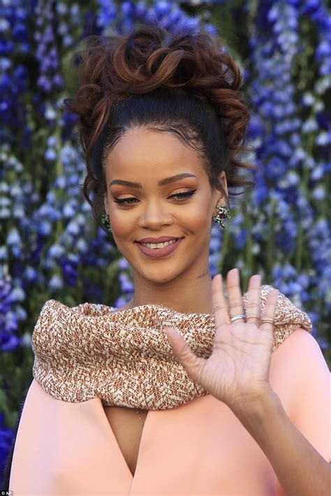 Rihanna Stuns In Over Sized Pink Coat Dress At Star