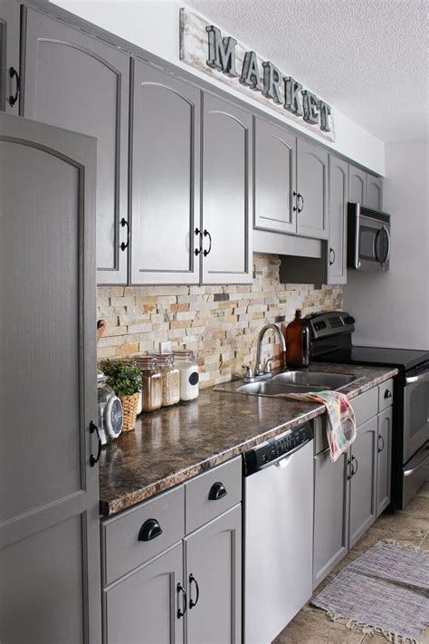 With modern kitchen appliances boasting stainless steel and with countertops and floors featuring equally industrial designs, a dark gray color for your cabinets and kitchen furniture is a solid choice. 25 Best Kitchen Cabinet and Furniture Painting Ideas for 2020