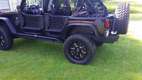 TRICKED OUT TACTICAL JEEP WRANGLER - YouTube