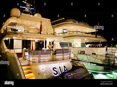 Lady Haya Super Yachts At Puerto Banus At Night With Nightlife And