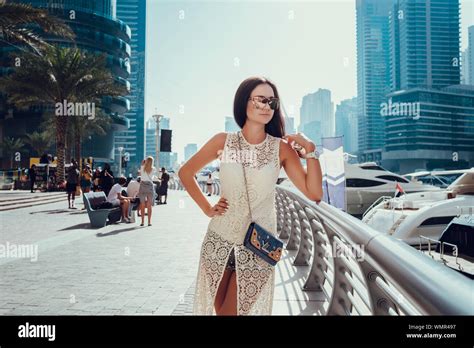 Happy Beautiful Unrecognizable Tourist Woman In Fashionable Summer