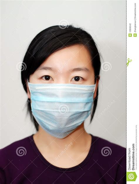 Asian Girl Wearing A Mask Stock Photo Image Of Hair
