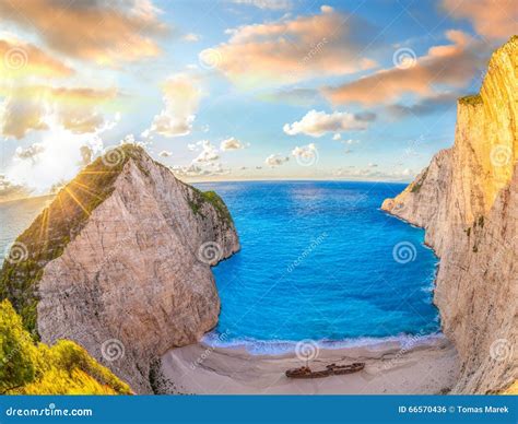 Navagio Beach With Shipwreck Against Colorful Sunset On Zakynthos