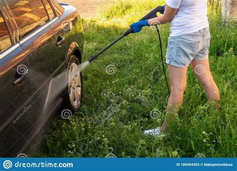 Car Wash A Woman Washes And Rubs A Car Stock Image Image Of Polish