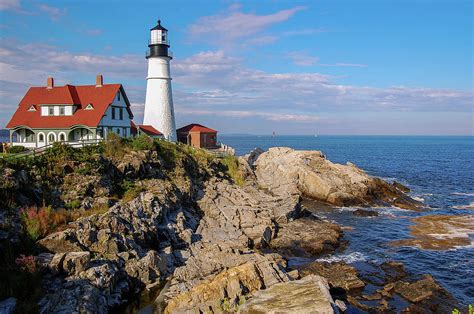 Portland Head Lighthouse On The Jagged Coastline Of Maine Photograph By